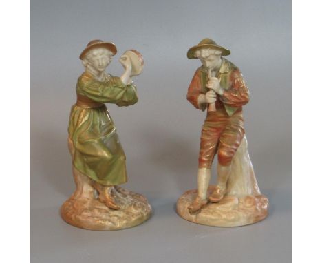 Pair of Royal Worcester figurines of musicians, both sitting on a tree stump on a naturalistic base. 16cm high approximately.