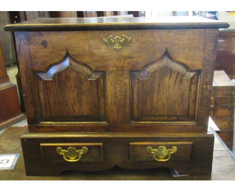 18th century style Welsh oak coffwr bach, the moulded top above two pointed ogee fielded panels, the projecting base with two