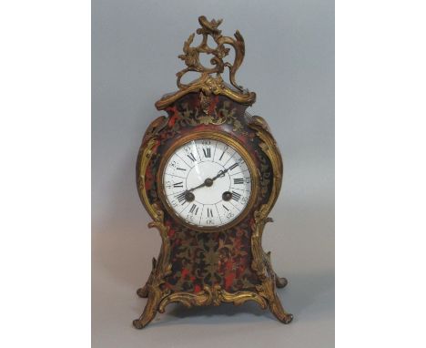 19th century French tortoiseshell boulle ormulu mounted balloon shaped clock with enamel Roman face and eight day two train m