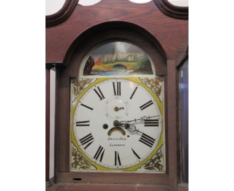 19th century Welsh oak eight day longcase clock by David Rees, Llanarth. Arch painted Roman face with floral spandrels and sc