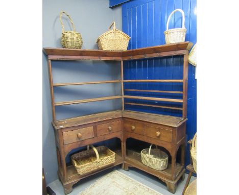 Unusual 19th century Welsh pine corner dresser having two shelf open rack back and four frieze drawers over a pot board base 