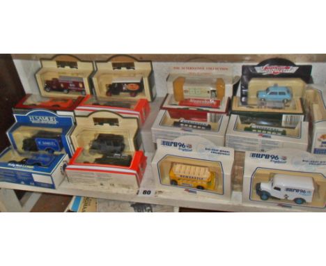 Shelf of assorted modern diecast commercial vehicles