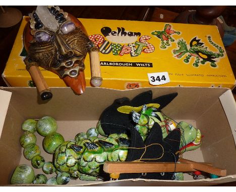 Vintage boxed Pelham puppet, Mother Dragon in VGC, together with a wall mask