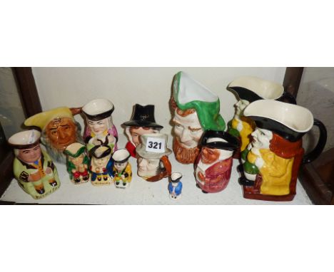 Shelf of miniature and larger Toby Jugs (13)