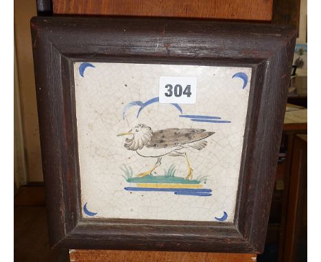 19th c. framed Delft polychrome tile with seabird and crescent corners