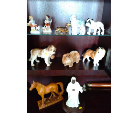 A Minton Sheikh figure 25cm with wood stand, six ceramic dogs including Sylvac, horse and a pair of boy and girl figures (10)