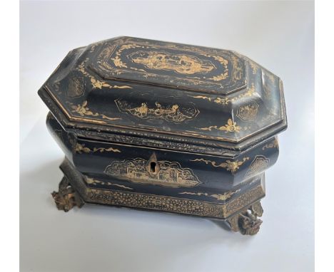An early 19th century Chinoiseries Two compartment Tea caddy. With gilt decoration. With a brass key.