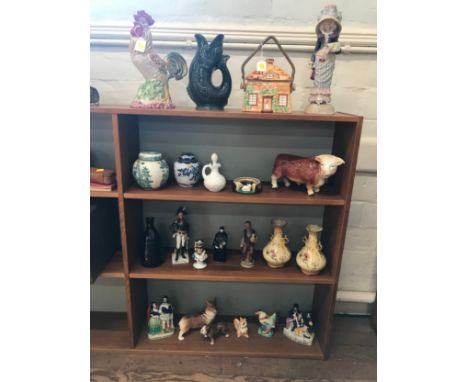 A Westminster Pottery cottage biscuit box, Dartmouth Pottery Plymouth Gin fish jug 24cm, ceramic figures, and two Ginger jars