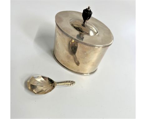 A late Victorian Sterling Silver Tea Caddy. Of plain oval form. Makers mark rubbed. Sheffield 1898. The hinged cover with fru