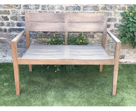 GARDEN BENCH BY ALEXANDER ROSE, weathered teak of contemporary outline and small proportions by Alexander Rose, 110cm W. 