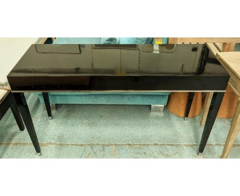 CONSOLE TABLE, contemporary black lacquered design, polished metal detail, 131cm x 46cm x 74cm. 