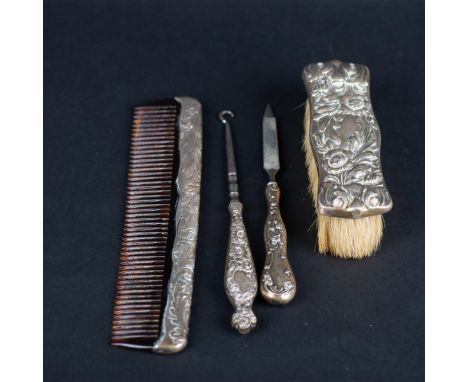 Tortoise shell comb with a sterling silver spine is 8"L. The brush is 5"L x 1.75"W x 1.5"H. The file is 6.75"L. The button ho