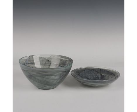 A stunning clear set that are adorned with black, gray, and white swirl art in their interiors. Dimensions of the largest ite