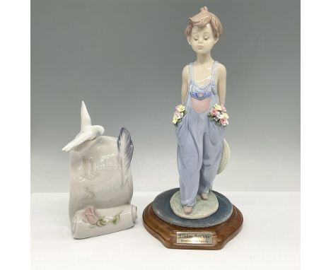 Sad figural in coveralls with flowers in pocket comes with Lladro Society Porcelain Art Scroll. Lladro backstamp. This item h