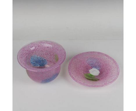 A set adorned with abstract pink dots, complemented by subtle green and blue accents. Marked Kosta Boda. Engraved Artist sign