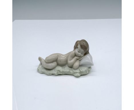 All babies are adorable, mortal and divine, It has a glossy finish with Lladro backstamp. This item has its original box and 