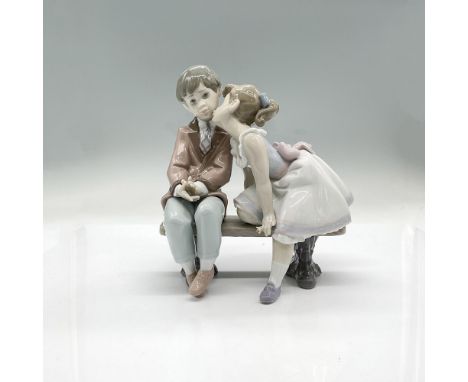 Remember your first kiss? Relive the moment with this endearing figurine. It has a glossy finish, Lladro backstamp and origin
