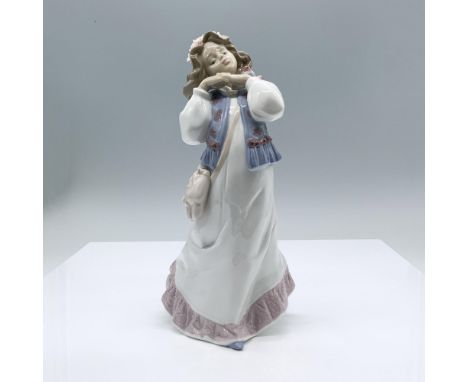 A dreamy depiction of reflection induces retrospect with this piece. It has a glossy finish and has the Lladro backstamp. Thi