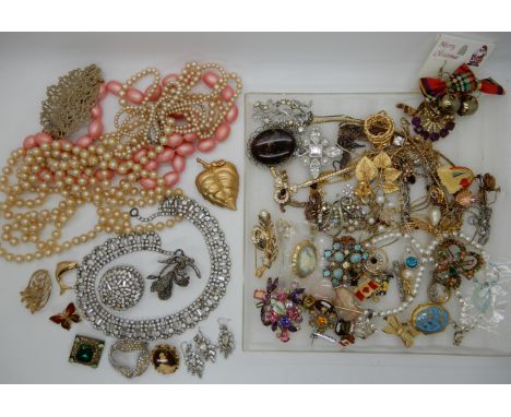 A collection of vintage costume jewellery Condition Report: Condition report not available for this lot.  