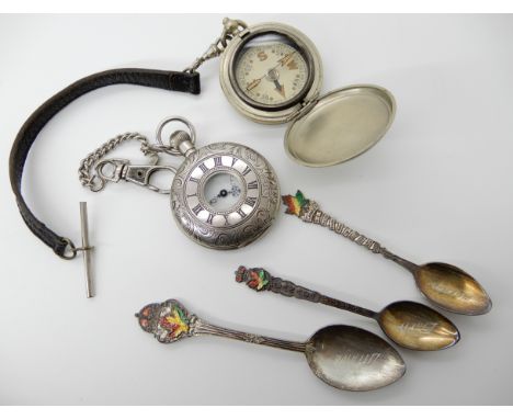 Three silver and enamel Canadian spoons, a pocket watch and a compass Condition Report: Condition report not available for th