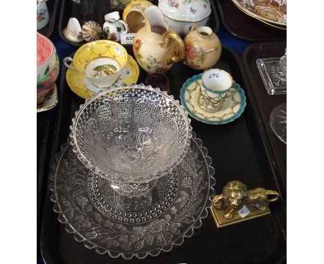 A Royal Worcester blush ivory jug and vase, both decorated with flowers, a Royal Worcester cup and saucer with silver mount, 