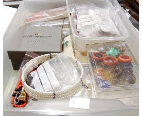 A box full of semi precious stones, beads, and costume beads to include, pearls, corals, amethyst briolette beads etc Conditi
