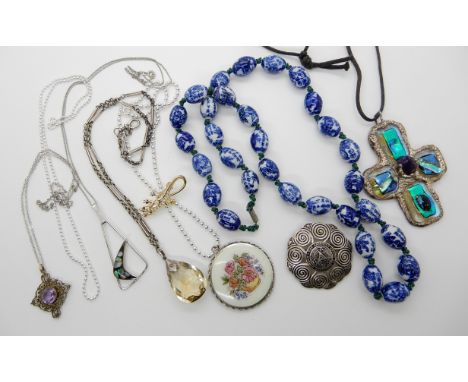 A silver and enamel pendant compact, Chinese blue and white beads, a citrine pendant and other items Condition Report: Availa