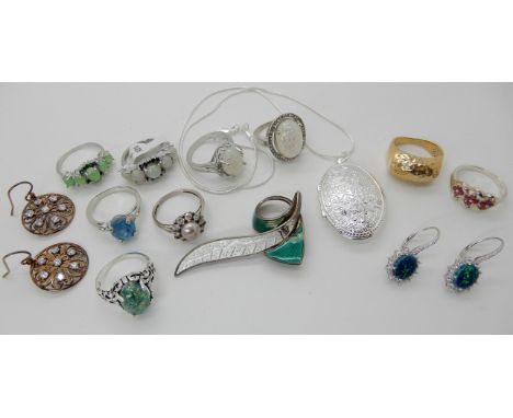 A Norwegian silver and enamel brooch (af) by Aksel Holmsen, a silver locket and a collection of silver and costume rings and 