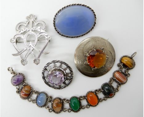 A Robert Allison amethyst brooch, a silver Scottish style agate and mixed gem set bracelet, white metal luckenbooth brooch an