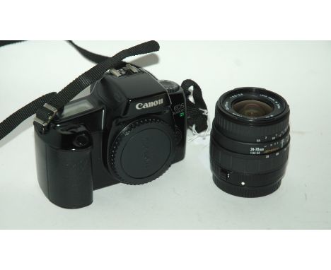 A Canon EOS 1000F camera in bag Condition Report: Available upon request