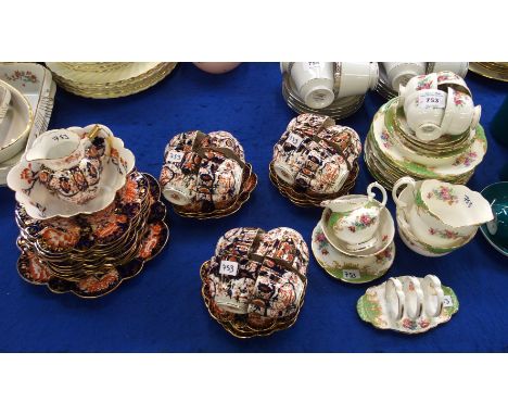 A Shelley and Wileman Foley teaset in imari palette comprising twelve cups, saucers and plates, cake plate, milk jug and suga