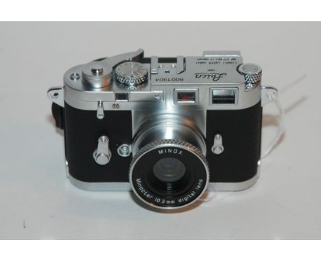 A Minox Leica miniature digital camera in case Condition Report: Available upon request