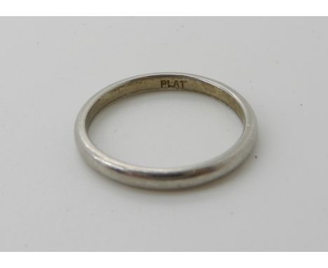 A platinum wedding band, size K, weight 2.8gms Condition Report: Medium general wear. 