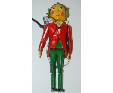 A Mr Turnip puppet taken from the BBC television series, finished in red, green and yellow, 17cm high, in original box Condit