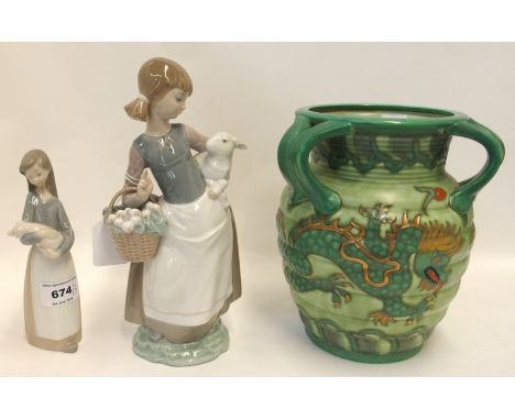 A Charlotte Rhead for Crown Ducal dragon vase and two Lladro figures Condition Report: Available upon request