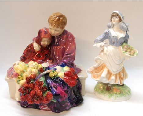 A Royal Doulton figure The Flower Sellers Children HN1342 together with a Royal Worcester figure Rosie Picking Apples Conditi