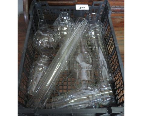 A collection of glass lamp funnels