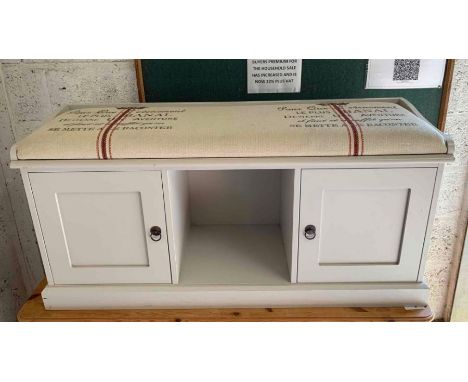 Painted storage bench with upholstered seat