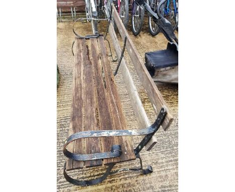 Large wrought iron framed garden bench