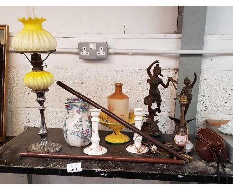 2  leather canes along with an oil lamp, 2 metal figures on bases &amp; other collectables