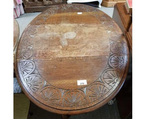 Carved oak gate legged table