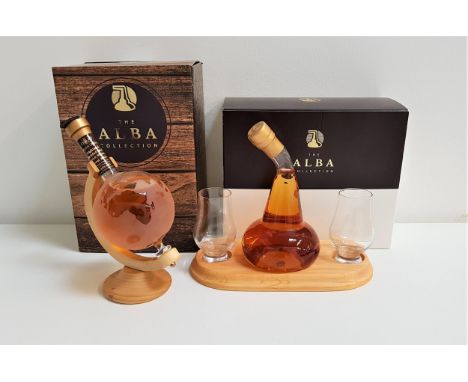 TWO THE ALBA COLLECTION WHIKSY DECANTERSone Mini Globe with stand and one Small Pot Still with stand and two glasses, both co