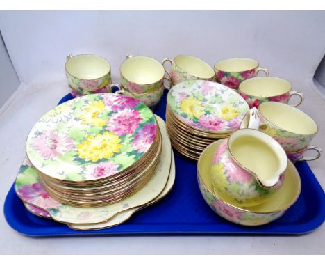 A Crown Staffordshire 40 piece floral pattern tea service.
