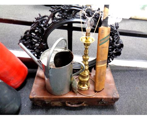 A galvanized watering can, continental brass table lamp, cricket bat, vintage leather luggage case together with two Rococo s