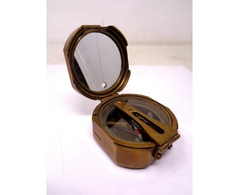 A Stanley of London brass pocket compass.