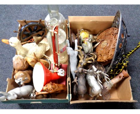 Two boxes containing assorted animal ornaments, glass spirit bottles, angle poise lamp etc.