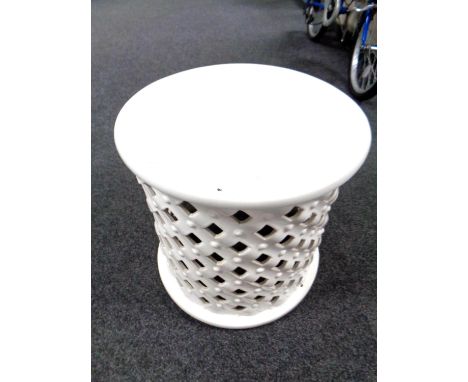 A white ceramic cylindrical stand (diameter 46cm).