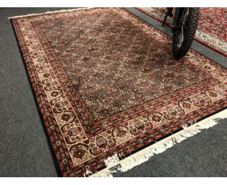 A carpet with repeat Herati motif on blue ground, probably Keshan, Central Iran, 203 cm x 300 cm 