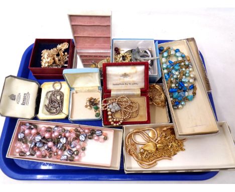 A tray containing vintage costume jewellery including necklaces, simulated pearl necklace, assorted brooches, lockets, earrin