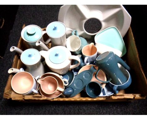 A box of miscellaneous Poole pottery dinner wares.